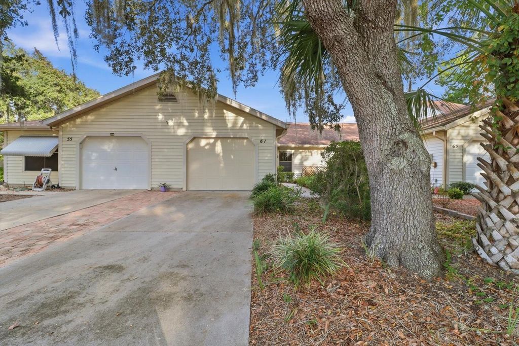 Photo of 61 S Heron Creek Loop, Inverness, FL 34450 (MLS # OM713142)