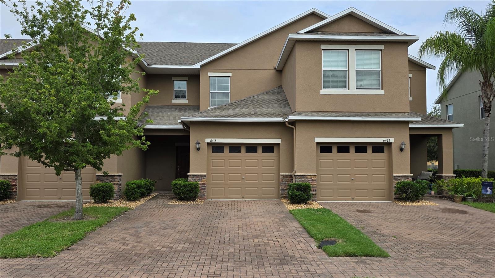 Welcome to this beautifully updated townhouse in the desirable gated community of Chelsea Oaks in Lakeland, Florida. This move-in-ready home features modern upgrades throughout, including stunning vinyl plank flooring in the kitchen and living areas, granite countertops, stainless steel appliances, and sleek cabinetry. Stylish light fixtures, including pendant lights over the breakfast bar and updated fixtures throughout, add a contemporary touch. The main level offers a warm wood accent wall, a convenient half bath, and a storage closet under the stairs. Upstairs, two spacious bedrooms each feature ceiling fans, generous closets, and private en suite baths, with a laundry closet conveniently located between them. Unique to this unit is a private vinyl-fenced backyard and a cozy 12x12 screened porch—perfect for relaxing or entertaining. Additional highlights include a one-car garage with overhead storage, a paver driveway, and added gutters for easy maintenance. Chelsea Oaks offers a gated entrance, community clubhouse, fitness center, and a swimming pool—all just steps away. With quick closing possible, this gem won’t last long—schedule your private showing today!