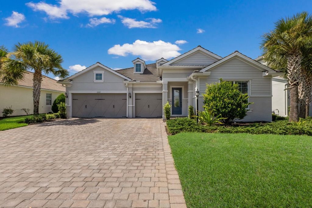 Photo of 12012 Blue Hill Trl, Lakewood Ranch, FL 34211 (MLS # A4660884)