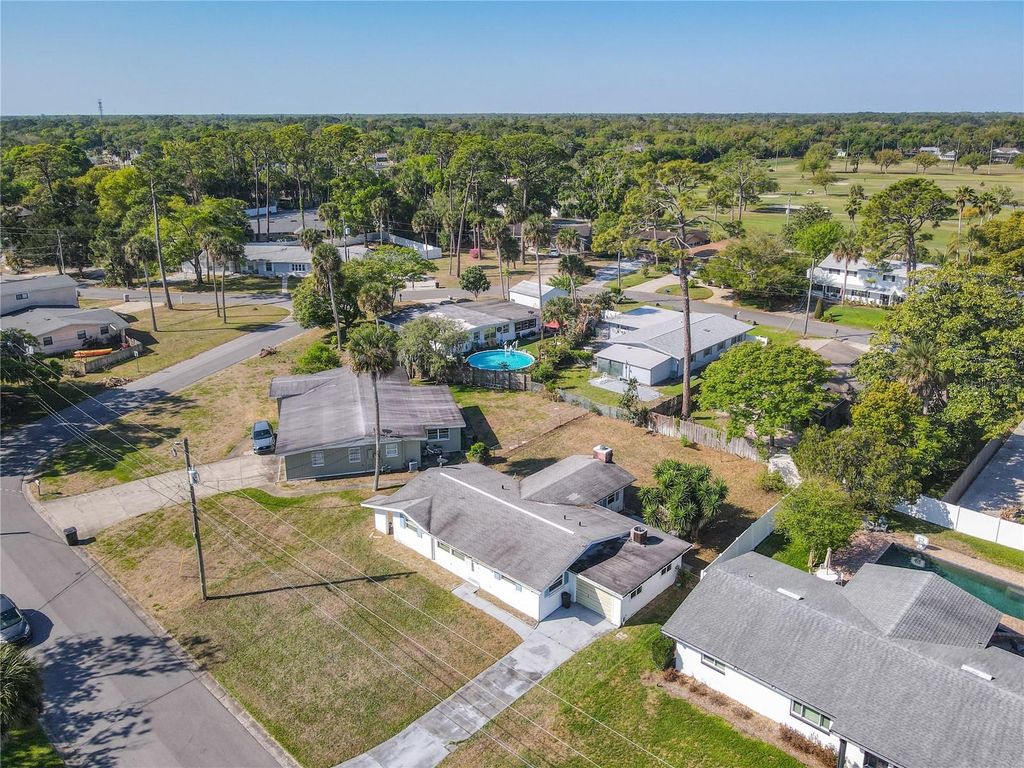 Photo of 6 Fairway Circle, New Smyrna Beach, FL 32168 (MLS # O6394290)