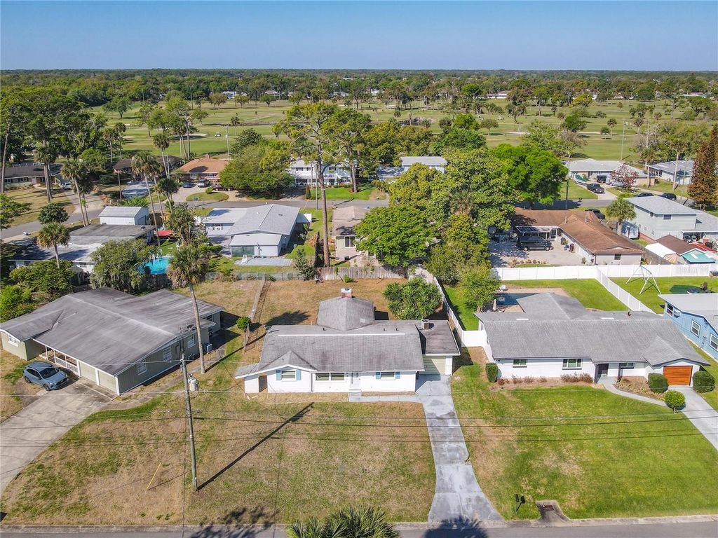 Photo of 6 Fairway Circle, New Smyrna Beach, FL 32168 (MLS # O6394290)