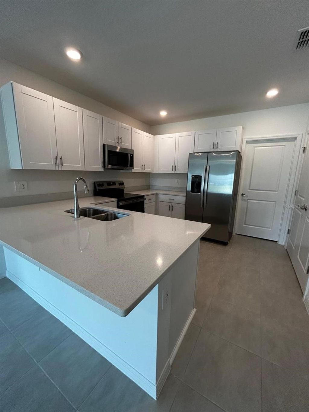 Photo of 5692 Le Marin Way, Kissimmee, FL 34758 (MLS # O6376274)