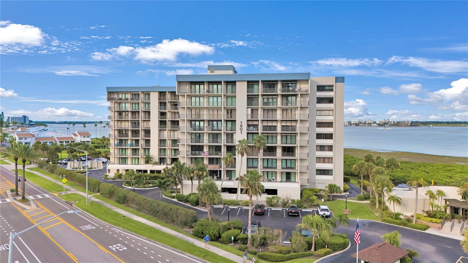 Your dream 3-bedroom beach retreat awaits!
Experience breathtaking, unobstructed views of the Intracoastal Waterway from every room in this beautifully renovated 3-bedroom, 2½-bath residence. Perched on the 3rd floor, this rare corner unit offers unparalleled privacy and a sweeping panorama from its expansive 40-foot private balcony—perfect for enjoying sunrise coffee or evening sunsets.
The open-concept design features a spacious kitchen with crisp white cabinetry and premium stainless steel appliances, seamlessly flowing into light-filled living spaces adorned with modern porcelain tile. The thoughtful split-bedroom floor plan ensures both comfort and privacy, all while maintaining continuous water views.
Exclusive South Bay amenities elevate everyday living: a geo-thermal heated saline pool overlooking the water, a whole-building water softener, secure gated entry, and convenient kayak/paddleboard storage with private waterway access. Additional perks include bike storage, a fully equipped clubhouse with kitchen, grill, billiards, and fitness room, plus adjacent public tennis and pickleball courts.
For beach lovers, easy access to the pristine sands of Sand Key Beach lies just across the street, while charming restaurants and boutique shops are only a short stroll away.
This residence is more than a condo—it’s a carefree coastal lifestyle where every detail has been designed with quality and elegance in mind. Opportunities like this are rare in highly sought-after Sand Key. Don’t miss your chance to own a piece of paradise! If you snooze you will lose!