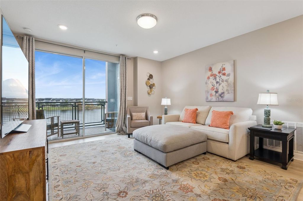 Photo of 7565 Laureate Boulevard #3304, Orlando, FL 32827 (MLS # O6366432)