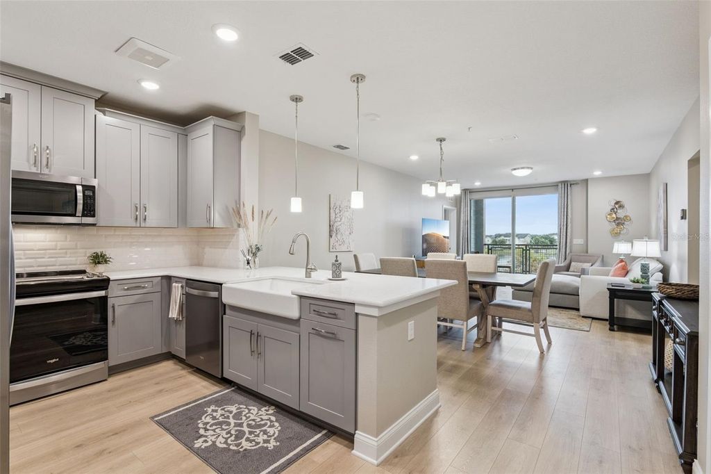 Photo of 7565 Laureate Boulevard #3304, Orlando, FL 32827 (MLS # O6366432)