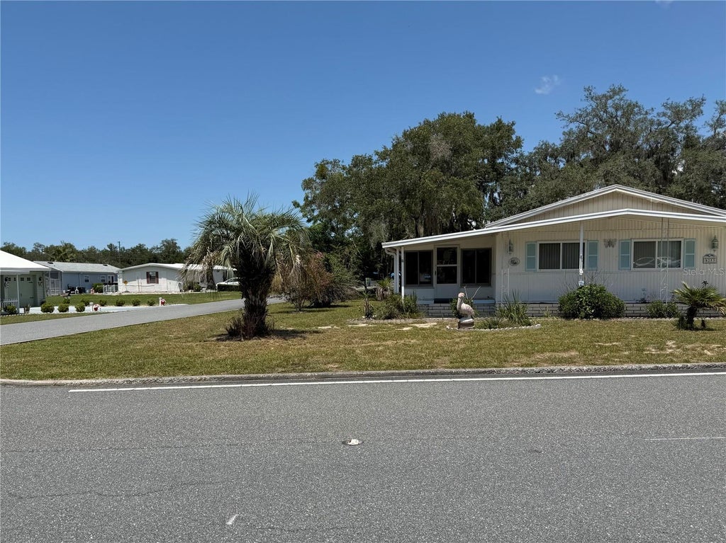 Photo of 8253 Highpoint Boulevard, Brooksville, FL 34613 (MLS # W7888429)