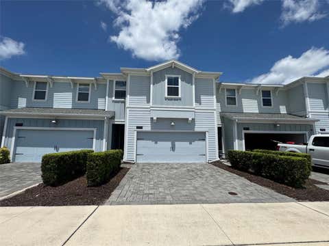Photo of 4915 Tribute Trail, Kissimmee, FL 34746 (MLS # O6420473)