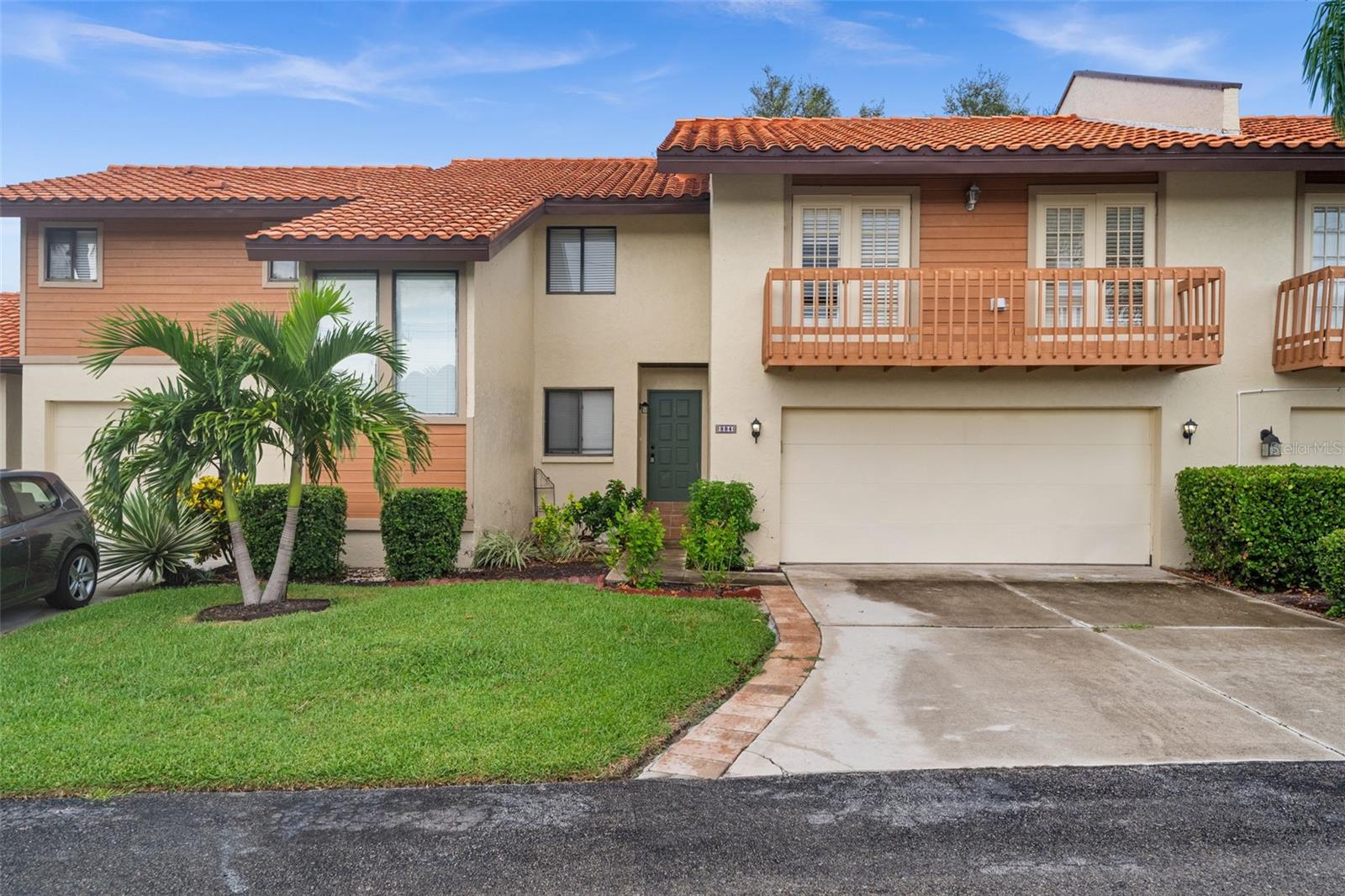 This rare furnished three-bedroom, two-bathroom condo in the boutique community of Sorrento Place offers over 1,550 square feet of well-designed living space and an attached two-car garage. The first floor features two bedrooms, including one with direct access to a bright Florida room that connects seamlessly to the living and dining areas. From here, sliding doors open to a private patio framed by mature landscaping and a fenced yard, creating an ideal space to enjoy Florida’s indoor-outdoor lifestyle. The kitchen has been upgraded with quartz countertops and modern appliances and provides direct access to the garage for convenience. Upstairs, the primary bedroom impresses with its generous size and private balcony, offering an inviting retreat with plenty of space for relaxation or a home office. Residents enjoy a beautiful community pool just steps away, and the community welcomes small pets. Ideally located west of US-41, this home is only minutes from Nokomis Beach and perfectly positioned between Sarasota and Venice, offering easy access to beaches, golf courses, shopping, dining, and entertainment.