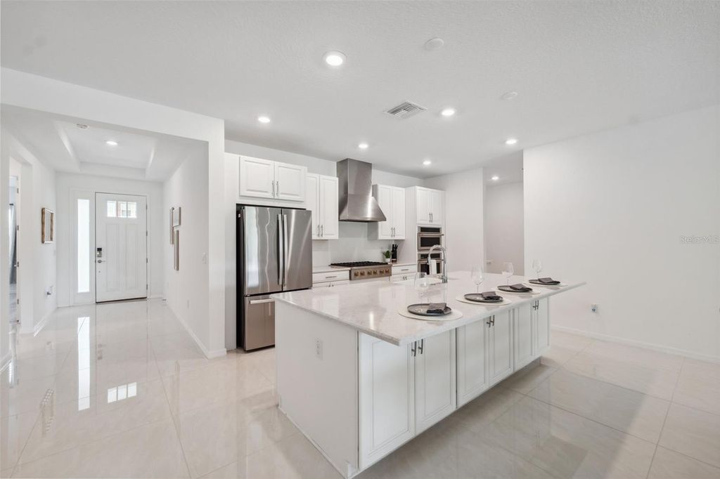 Photo of 33466 Landsman Loop, Wesley Chapel, FL 33543 (MLS # W7876487)