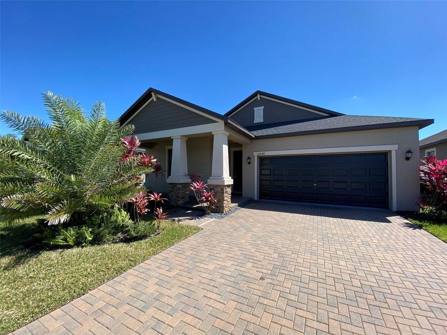 This beautifully maintained 4-bedroom, 3-bathroom home in the desirable Belmont community of Ruskin offers 2,040 square feet of comfortable living space. The home features a three-way split bedroom plan, ceramic tile floors throughout the main living areas, and carpeted bedrooms. The kitchen boasts stainless steel appliances, granite countertops, and a breakfast bar that opens to the family room with serene pond views. The master suite includes a walk-in closet, dual vanities, a garden tub, and a separate shower. Washer and dryer are included. Outside, enjoy a covered patio overlooking a peaceful backyard and pond, plus an attached 2-car garage. Conveniently located near schools, parks, and major roads, this home combines modern comfort with a tranquil suburban setting.