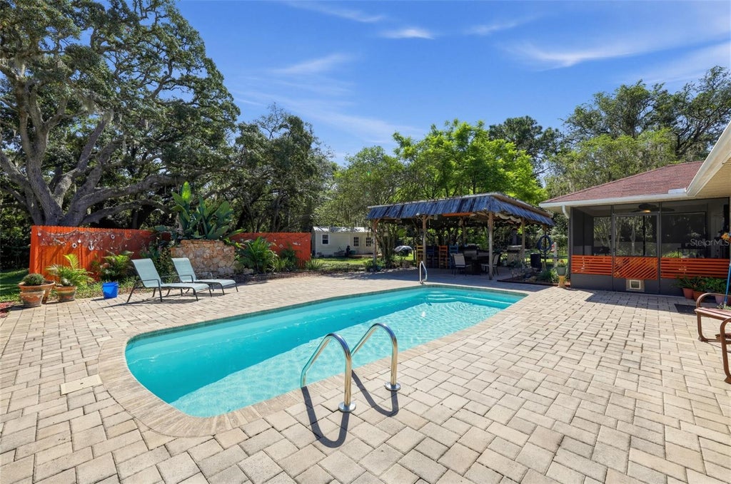 Photo of 9124 Flint Street, New Port Richey, FL 34654 (MLS # TB8555668)