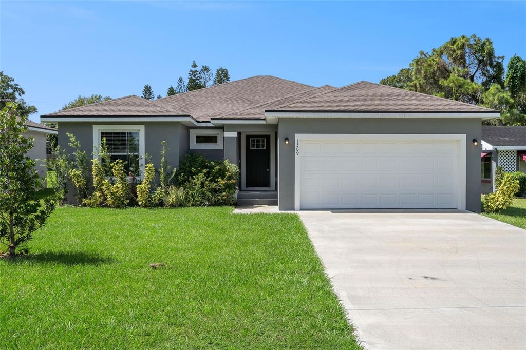 Photo of 1309 26th Street NW, Winter Haven, FL 33881 (MLS # O6352228)