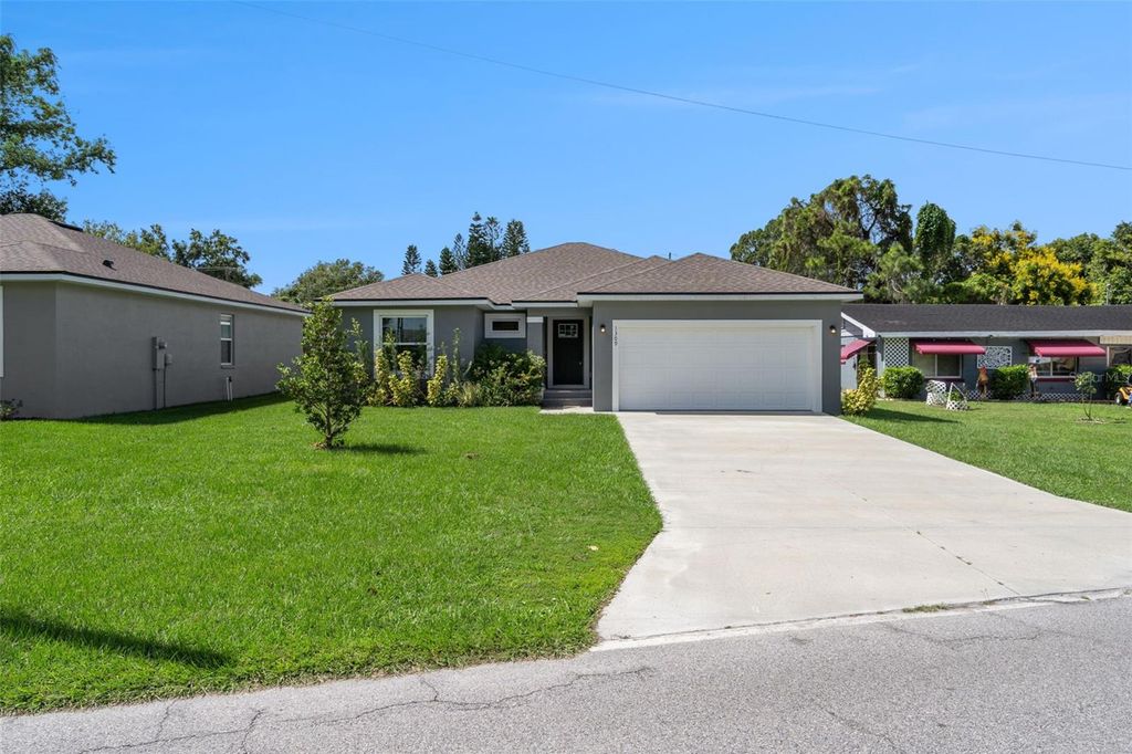 Photo of 1309 26th Street NW, Winter Haven, FL 33881 (MLS # O6352228)