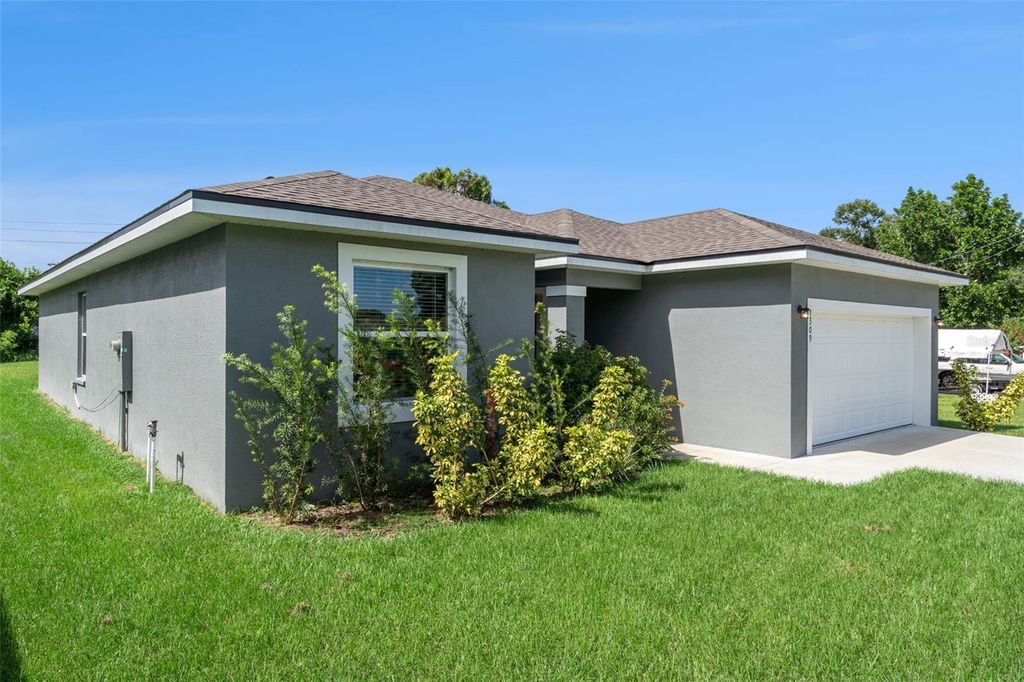 Photo of 1309 26th Street NW, Winter Haven, FL 33881 (MLS # O6352228)