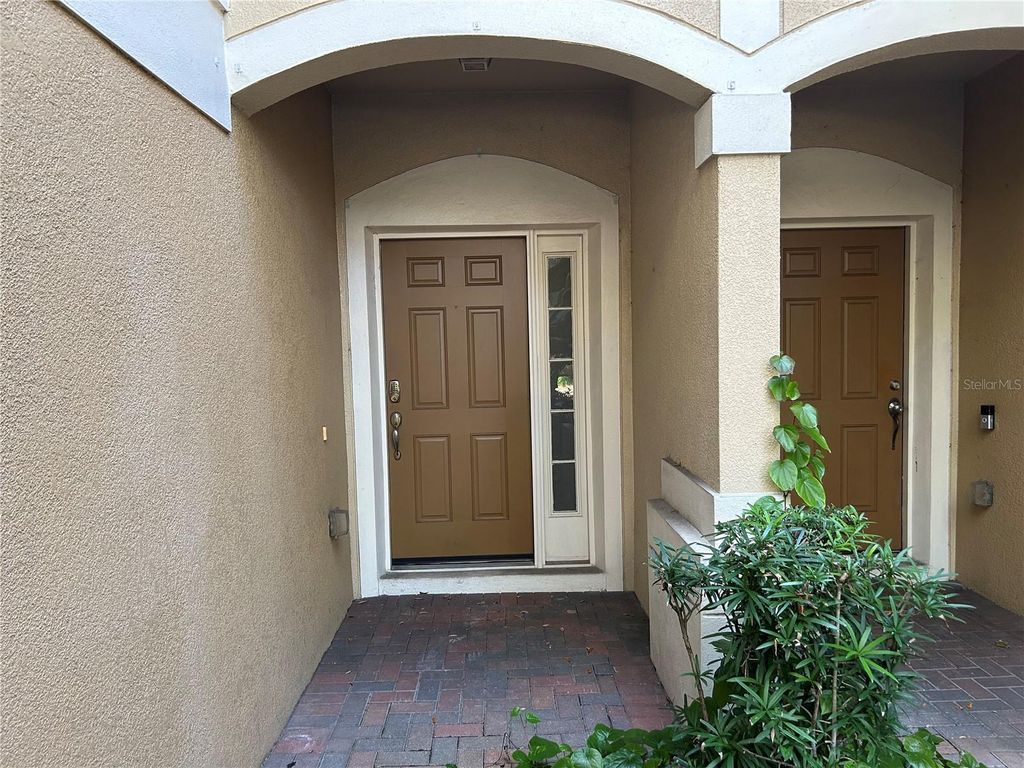 Photo of 3497 Shallot Drive #104, Orlando, FL 32835 (MLS # O6367637)