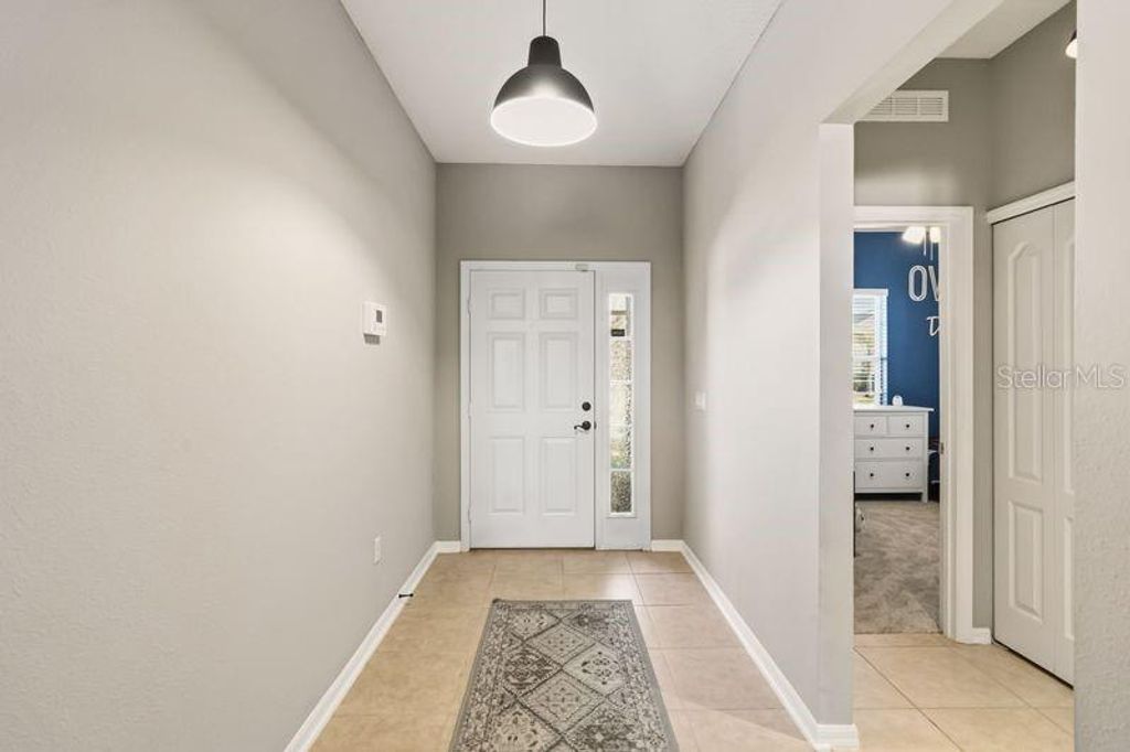 Photo of 5450 Silver Thistle Lane, Saint Cloud, FL 34772 (MLS # S5143146)