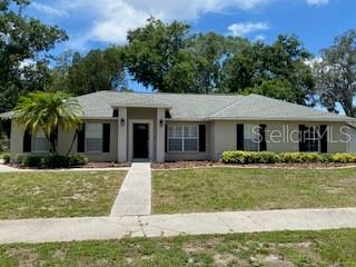 This home is located in Forest Hills. It is a concrete block one story home on an oversized corner lot. Interior has been totally remodeled. In 2018, the inside was painted, all new flooring and window treatments were added and vinyl fence installed in the back yard. In 2023, the bathrooms were remodeled. The second bathroom has a skylight which provides plenty of natural light. In 2024, the kitchen was remodeled with shaker cabinets soft close drawers and pull outs in the large pantry. The garage is oversized and side facing. There is a shed on the property which was built in 2004. In the interior of the shed it has been divided where the front portion has a door facing the street. The rear of the shed has a door that goes out into the backyard.
The screened in patio off the kitchen is perfect to sit and enjoy your morning coffee before the start of your day.