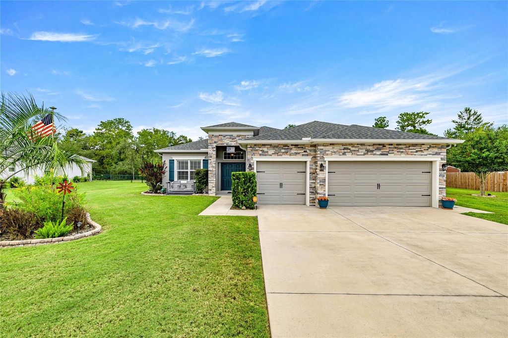 Photo of 11251 SW 54th Circle, Ocala, FL 34476 (MLS # OM709641)