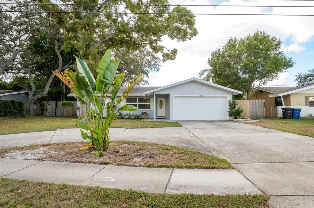 Photo of 1749 Sunset Point Road, Clearwater, FL 33755 (MLS # TB8558736)