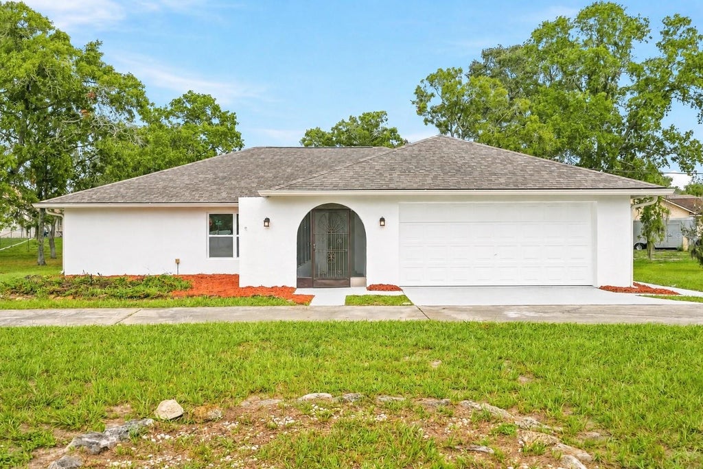 Photo of 1118 Trinidad Avenue, Spring Hill, FL 34609 (MLS # TB8544047)