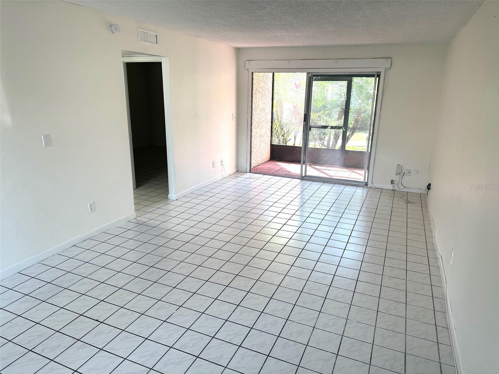 Exceptional Investment Opportunity in Tampa Bay – Turnkey 1BR/1BA Discover this beautifully maintained 1-bedroom, 1-bathroom condo in North Bay Village's highly sought-after gated community. Currently tenant-occupied, this first-floor unit offers immediate rental income, making it an ideal addition to any investor's portfolio or a perfect vacation retreat. Step inside to find a spacious, open-concept layout featuring fresh paint, brand-new carpet, and tile flooring. The functional kitchen boasts granite countertops and ample cabinetry, while both generously sized bedrooms include walk-in closets for added convenience. Enjoy your morning coffee or unwind in the evening on the private screened-in patio with serene views. This pet-friendly waterfront community offers an array of resort-style amenities, including four sparkling pools, a clubhouse, tennis courts, walking and jogging trails, dog parks, and even a boat ramp with optional trailer parking—perfect for boating enthusiasts. Monthly HOA fees cover water, sewer, trash, and flood insurance, adding to the property's value and ease of ownership. Centrally located just minutes from Tampa International Airport, International Plaza, downtown Tampa, and the Gulf beaches, this condo offers unmatched convenience and lifestyle appeal. A completed structural engineering study, this is a rare opportunity to own a solid, income-generating property in one of Florida's most vibrant regions.