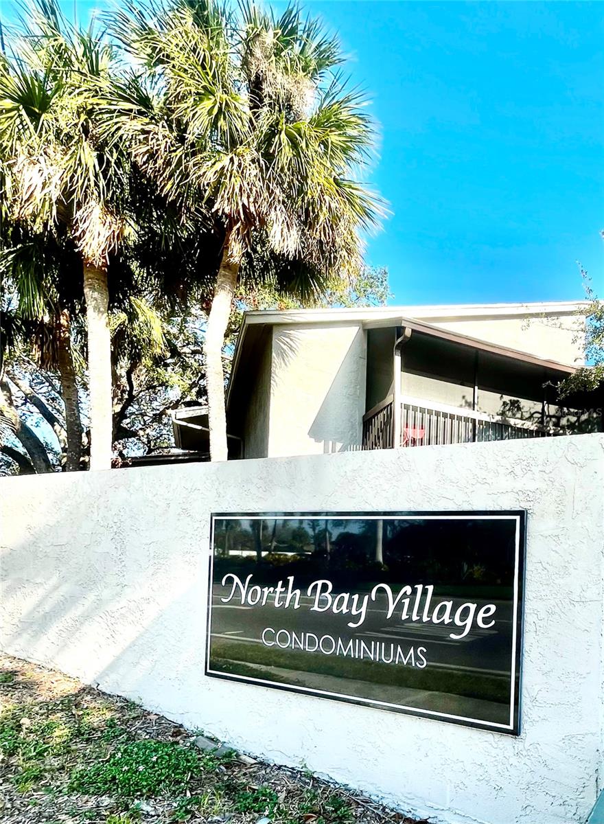 Exceptional Investment Opportunity in Tampa Bay – Turnkey 1BR/1BA Discover this beautifully maintained 1-bedroom, 1-bathroom condo in North Bay Village's highly sought-after gated community. Currently tenant-occupied, this first-floor unit offers immediate rental income, making it an ideal addition to any investor's portfolio or a perfect vacation retreat. Step inside to find a spacious, open-concept layout featuring fresh paint, brand-new carpet, and tile flooring. The functional kitchen boasts granite countertops and ample cabinetry, while both generously sized bedrooms include walk-in closets for added convenience. Enjoy your morning coffee or unwind in the evening on the private screened-in patio with serene views. This pet-friendly waterfront community offers an array of resort-style amenities, including four sparkling pools, a clubhouse, tennis courts, walking and jogging trails, dog parks, and even a boat ramp with optional trailer parking—perfect for boating enthusiasts. Monthly HOA fees cover water, sewer, trash, and flood insurance, adding to the property's value and ease of ownership. Centrally located just minutes from Tampa International Airport, International Plaza, downtown Tampa, and the Gulf beaches, this condo offers unmatched convenience and lifestyle appeal. A completed structural engineering study, this is a rare opportunity to own a solid, income-generating property in one of Florida's most vibrant regions.