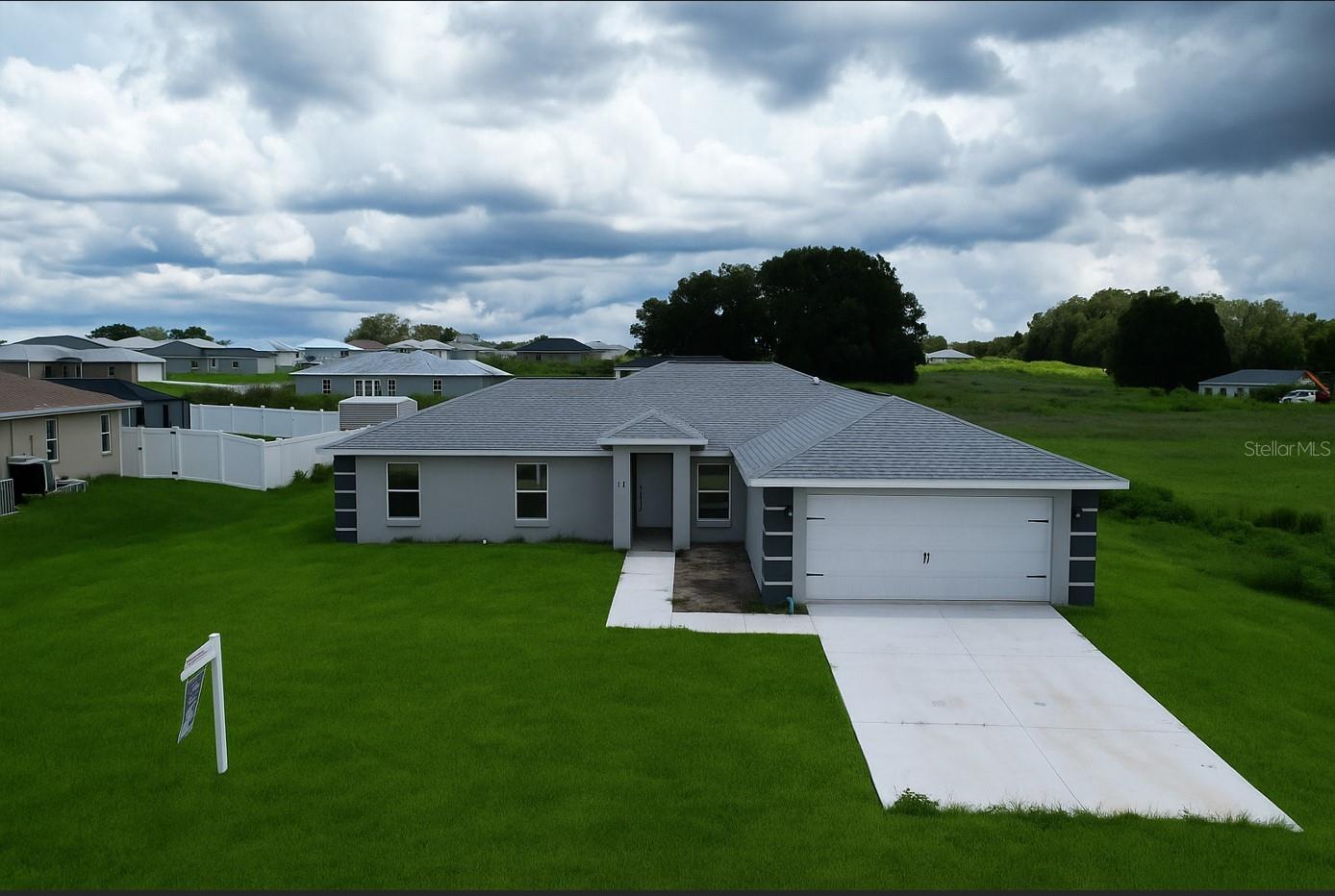 New Build 4-bedroom, 2-bath home nestled on a spacious 0.33-acre lot in the heart of Inverness, Florida — a charming town known for its natural beauty, peaceful atmosphere, and small-town feel. With no HOA restrictions, you’ll enjoy the freedom to truly make this property your own.
Step inside to find luxury vinyl flooring throughout, offering a clean, modern look with no carpet in sight. The home showcases stylish finishes and sleek, contemporary fixtures, creating a bright and welcoming space ready to move in.
One of the standout features is the dedicated RV hookup with water and electric connections on the side of the property — perfect for travelers, guests, or additional flexibility.
Whether you're looking for comfort, convenience, or a great location close to parks, lakes, and outdoor adventures, this home has it all.
