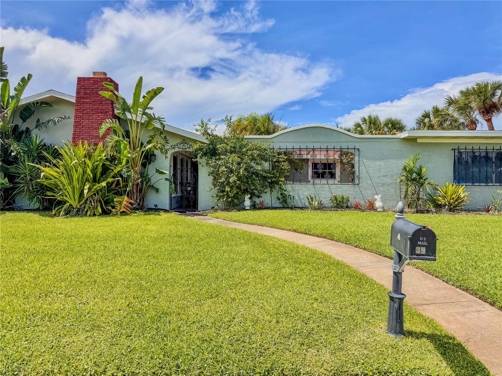 Just Steps to the Ocean - Stunning 4BR/3BA Pool Home in Ormond by the Sea. This beautifully maintained single-story corner lot home offers the perfect blend of coastal charm and modern elegance, just steps from the sparkling shores of Ormond by the Sea. Featuring 4 spacious bedrooms and 3 full bathrooms, this residence boasts marble tile flooring throughout—no carpet in sight—for a sleek, easy-to-maintain finish. The inviting open floor plan flows seamlessly from the living and dining spaces into a chef's kitchen adorned with granite countertops, stainless steel appliances, and modern fixtures. The private pool and large fenced-in patio create the ultimate outdoor oasis, ideal for entertaining or relaxing after a day at the beach. With beautiful curb appeal, a 2-car garage, and a prime location minutes from both Daytona Beach and downtown Ormond Beach, this home delivers an unbeatable combination of style, comfort, and convenience.