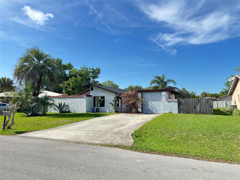 Photo of 27 Farmbrook Lane, Palm Coast, FL 32137 (MLS # A4688371)