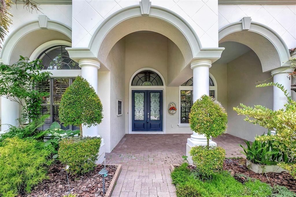 Photo of 9630 Tree Tops Lake Road, Tampa, FL 33626 (MLS # TB8377625)