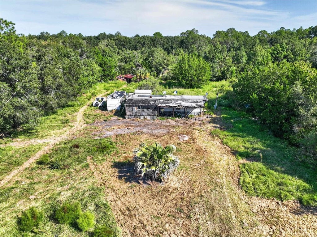 Photo of 301 County Road 2006 E, Bunnell, FL 32110 (MLS # FC321964)