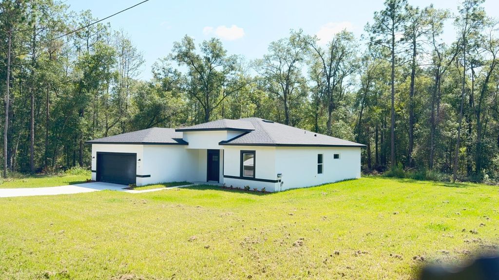 Photo of 42 W Stockel Lane, Citrus Springs, FL 34434 (MLS # O6339728)
