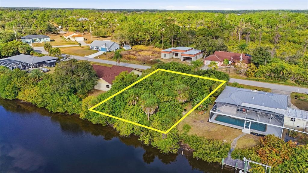 Photo of 12309 Mitchell Terrace, Port Charlotte, FL 33981 (MLS # C7521345)