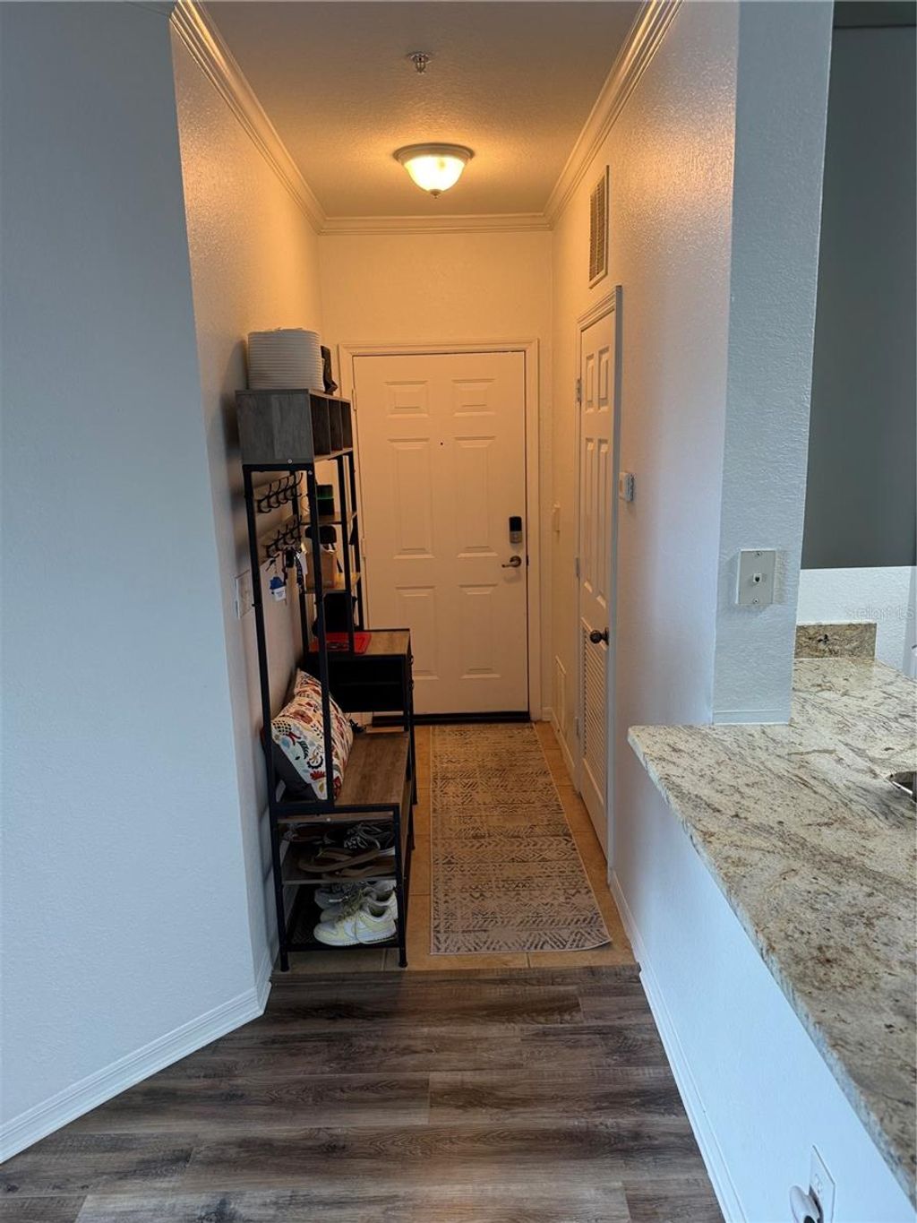 Photo of 10201 Courtney Palms Boulevard #204, Tampa, FL 33619 (MLS # O6388221)