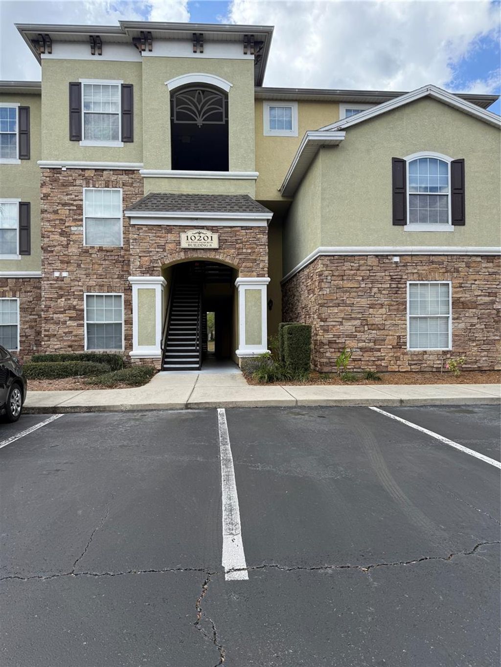 Photo of 10201 Courtney Palms Boulevard #204, Tampa, FL 33619 (MLS # O6388221)