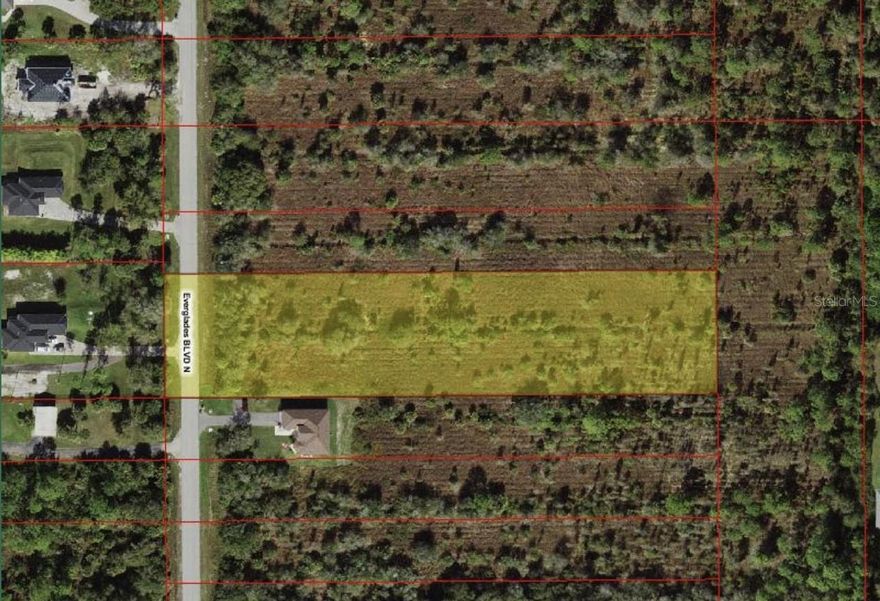 Beautiful large 2.34 acre lot ready to build your dream home! Free and clear, no HOA and no deed restrictions! Electric available and paved road, SEWER LINES ARE NOW BEING INSTALLED BY COLLIER COUNTY. Close to Immokalee Road and minutes away from Publix, restaurants, shopping center & easy access into town! Large Development going in very close to this hot area. Nice homes all around yet private.