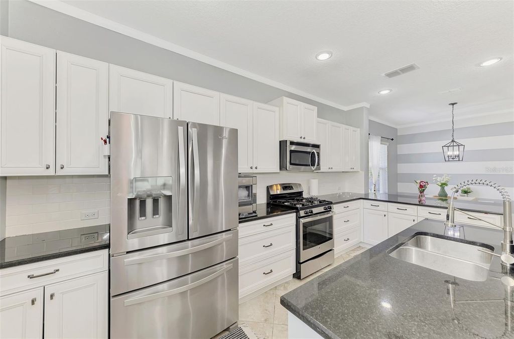 Photo of 5008 Mission Park Lane, Bradenton, FL 34211 (MLS # A4690189)