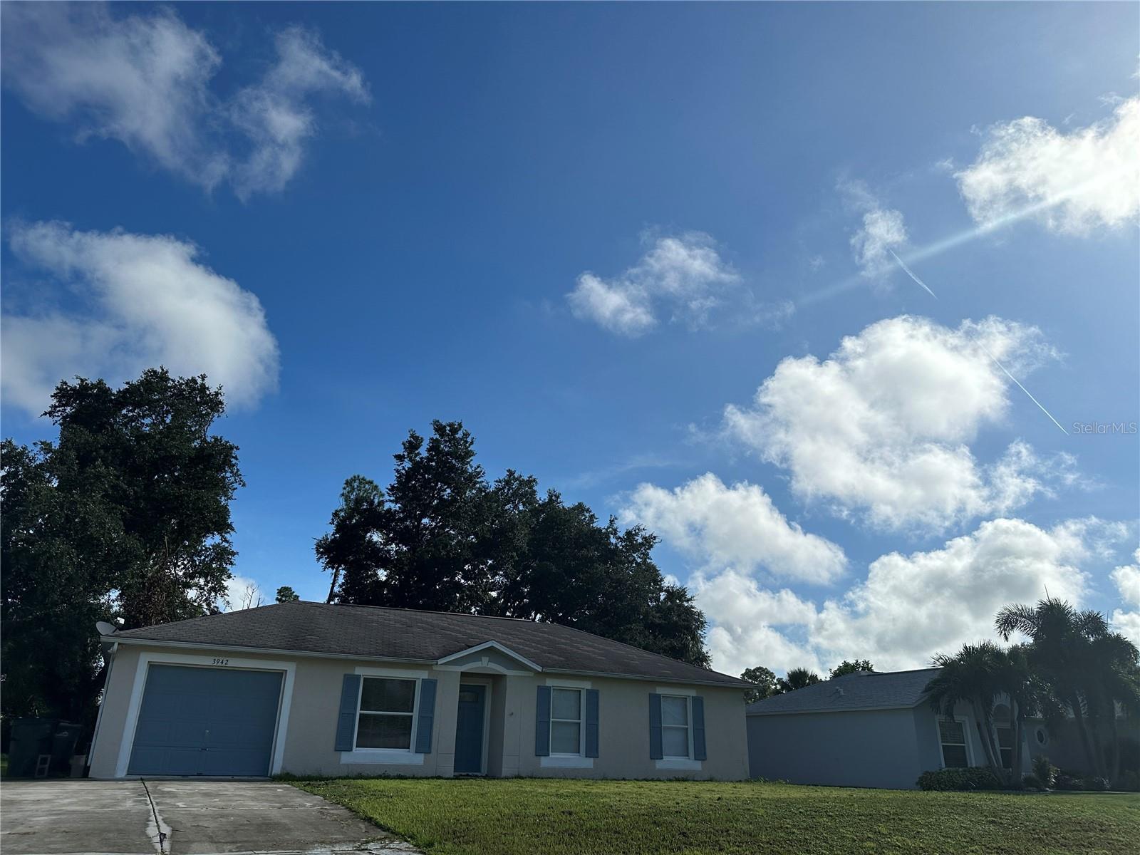 Located in the heart of North Port, this home provides the convenience of both I-75 and US 41 just minutes away. Perfectly situated for the commuter. Offering availability soon in a floor plan that is designed to comfortably accommodate the entire family. No carpet here and your 4-legged babies are welcome too with approval. They will love the sprawling out on the cool tile. Large backyard to zoom around and burn off the stored energy. Recently painted and new laminate flooring in the bedrooms in a warm color scheme that will well complement your decor. The primary suite offers a walk-in closet and ensuite bathroom. Spacious interior laundry room to make it feel less of a chore. The garage features tile flooring which can act as both a storage area or a place to park. You pick. All this and CITY WATER too. Those of us who have endured North Port well water can attest to value of this amenity. North Port packs a big punch with a concerted emphasis on family life. Great schools, beautiful parks, miles of waterways make it a great place to call home.