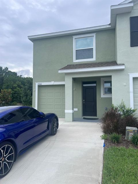 Photo of 17461 Spanish Oak Loop, Land O Lakes, FL 34638 (MLS # TB8521687)