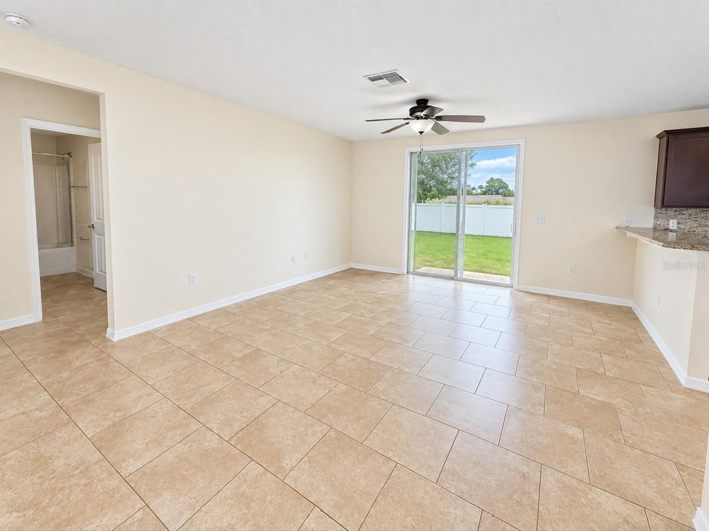 Photo of 441 Savannah Preserve Loop, Davenport, FL 33837 (MLS # S5158307)