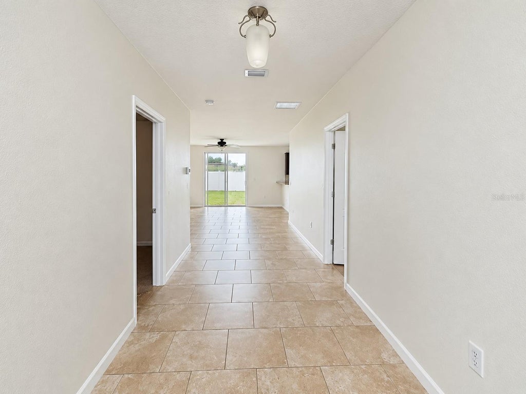 Photo of 441 Savannah Preserve Loop, Davenport, FL 33837 (MLS # S5158307)