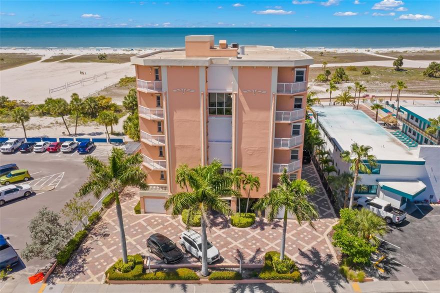 UNIQUE UNPARALLELED OPPORTUNITY!!  The Venetian is the only building on the Treasure Island Beach Trail that offers an entire floor of living space with 5 balconies offering over 1,100 square feet of outdoor space with astounding views and sunsets.  You will access this spectacular home via Secure PRIVATE elevator entry with immediate openness and breathtaking views of the Gulf of Mexico.  This spectacular 3-bedroom, 3 bathroom and powder room encompass 3,650 sq. ft. of living space offering the best of what luxury has in store.  The elegant entryway will greet you and your guests into an area that includes decorative etched French glass doors, huge foyer accented with a Rotunda ceiling and gorgeous Marble flooring.  The 41-foot-wide wall of brand-new high impact hurricane glass sliders will take you outdoors to your own private balcony where you will overlook the sugar sands and sparkling blue waters!  Luxury meets comfort with panoramic views and features that include a great room with double crown molding, hardwood flooring and plenty of space for oversized furniture, as well as,  an opportunity for a second sitting area making it ideal for entertaining family and friends!  The kitchen is a chef’s dream with Granite counters, tile backsplash, wall ovens, cooktop, and custom maple cabinets with glass fronts and crown.  The center island has more storage, additional counter space that is perfect for a coffee or wine bar, built-in beverage fridge and lastly an ajoining dining area allowing for those informal meals.  Access the formal dining room through the butler’s pantry where you will find beautiful hardwood floors, Rotunda ceiling and walls of windows.  The Massive Master Suite Wing is accessed through double doors revealing plenty of room for a separate sitting area accented by beautiful tray ceilings. The ensuite includes a walk-in shower, jetted/garden tub, granite counters, oversized vanity with extra counter space and a secondary sink allowing for dual use of bathroom.  The walk-in closet is oversized and has a boutique closet system installed.  Furthermore, on the far end of the suite includes an additional area that can be made into another room, sitting area, or office.  The options are endless.  The Guest Wing is located on the south side of the home and features 2 private guest rooms, both include their own en-suite bathroom and one that includes a large enough area to accommodate a sitting area or office.  Additional features include concrete exterior construction, hurricane shutters and panel for door entry/exit, 2 Trane HVAC, 3-ton systems (2020), 16 seer heat pumps, split system. Additionally, architectural designs including arch doorways in all the main living spaces, crown molding, 5” baseboards, plantation shutters, ceiling fans throughout, an in-unit laundry room with utility sink and cabinetry. This condominium has first floor, PRIVATE garage parking with double doors,  spacious parking with custom work bench and added electrical and lighting. An additional assigned parking spot can be used for an extra vehicle or guests.  The community pool is private and has a fountain feature, outdoor shower, lounge chairs and a spot for shade when needed!  Treasure Island is known for its crystal-clear waters, beaches, sunsets, fishing, boating, unique restaurants and shops, venues with live music and easy access to downtown St. Petersburg and the new St. Pete Pier awaits your arrival.