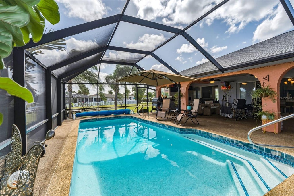 Photo of 110 Leland Street SW, Port Charlotte, FL 33952 (MLS # C7532288)