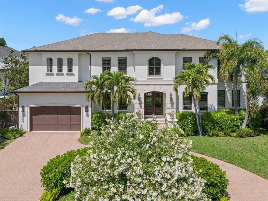 Welcome to a stunning Sunset Park pool home built by Campbell Custom Development. This one owner home has been beautifully maintained and features 2 story block construction with sand stucco finish, Bevolo gas coach lights at entry, Low-E Jeldwen impact windows and smooth finish drywall. The entry foyer is flanked by the formal living room and dining room and opens up into the great room with a gas fireplace and double sets of French doors out to the covered lanai. The eat-in chef's kitchen overlooks the great room with a Wolf dual fuel 48" range with a pot filler faucet, Sub-Zero refrigerator, Bosch dishwasher, a walk-in pantry and butler's pantry with a Uline wine refrigerator. Enjoy informal dining in the breakfast area off the kitchen overlooking the backyard and pool. A tucked away office/den with custom built-ins & downstairs bedroom/bathroom conclude the downstairs. Upstairs you will find the large bonus room, laundry room, an ensuite, 2 additional bedrooms that share a jack and jill bath and the oversized primary suite with dual walk-in closets, double vanities, soaking tub and walk-in shower. Enjoy outdoor entertaining with a covered lanai featuring a kitchen with a 36" Alfresco grill and Uline beverage center plus a large pool surrounded by loads of privacy landscaping. Additional features include: 3 car tandem garage, full house water filtration system,, beautiful 7-1/4 baseboards and crown molding, solid wood interior doors, marble primary bathroom and handscraped engineered hardwood floors in all areas except laundry and baths. Minutes to Hyde Park, Soho, Downtown, TIA, International Mall, wonderful restaurants, shopping and the Gulf beaches.