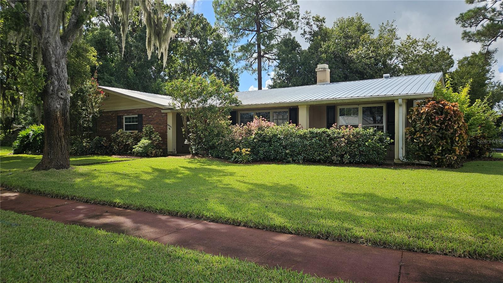 This 4 bedroom, 2 bath home sits on a corner lot in the desirable Sherwood Estates neighborhood of Titusville. The spacious floor plan includes a living room with a cozy fireplace and a kitchen with updated appliances.. The primary suite features a recently renovated bathroom for a private retreat. Other major updates completed in the last 5 years include a new roof, water heater, and HVAC system, providing peace of mind and efficiency. The fully fenced backyard is perfect for pets, entertaining, or simply relaxing in your own private space. Conveniently located near schools, parks, and just minutes from Kennedy Space Center, with easy access to Orlando attractions. This property blends comfort, convenience, and charm - perfect for your next chapter!
