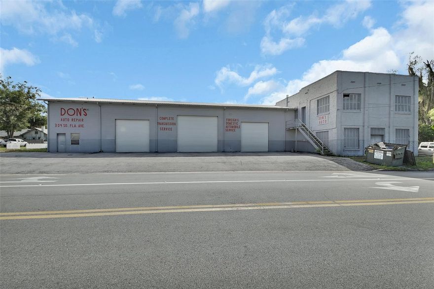 Established business since 1972 as a successful Auto Repair Shop.  Fully functional and ready to go with 12,228 sq. ft of usable working space, 7 Bays and 6 Car lifts. 2 additional parcels included in this sale which include 701620010070 136 W Voorhis Ave Deland and 701620010110 141 W New St Deland.  Although this property is set up for an Auto Repair shop, this property which comes with 3 individual parcels includes all types of zoning for all different types of usage.  Light Manufacturing, Warehouse, Commercial, Office space and Residential.  .91 acres covers all three parcels.  Attached in pics you will find all the different uses for this property and land.  You will find 3 different entry access areas to this property, which is great for renting out different parts of this huge building creating 3 different rental spaces.  You can enter off of Voorhis as well as W New St and of course the main entrance off of Florida. The property has lots of equipment that can stay if negotiated with the building including a commercial sized compressor and 6 lifts, motor lifts etc. The main shop includes a waiting room, office, 2 bathrooms, parts room, upstairs apartment and several separate areas for storage. 3 large bays across the front of the building which are tall enough to accommodate a semi truck. Off of Voorhis Ave, you can enter the property and find plenty of parking with 4 additional bays and bathroom in the back area.  On the New St side of the property you will find a vacant lot for lots of additional parking. Located just at the end of the Famous Downtown Deland area you are able to walk to all the fantastic restaurants, shops and events that Deland has to offer.  This is a fantastic location for starting your new business or finding a larger building for your established business. Give me a call today for your private tour to see how you can turn this property into your money making dream!