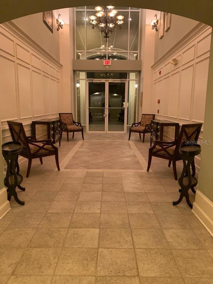 Photo of 3362 Robert Trent Jones Dr #101, Orlando, FL 32835 (MLS # O6450099)