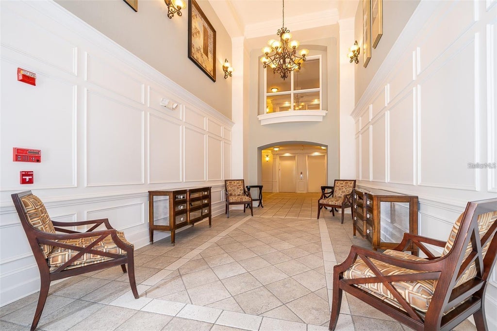 Photo of 3362 Robert Trent Jones Dr #101, Orlando, FL 32835 (MLS # O6450099)