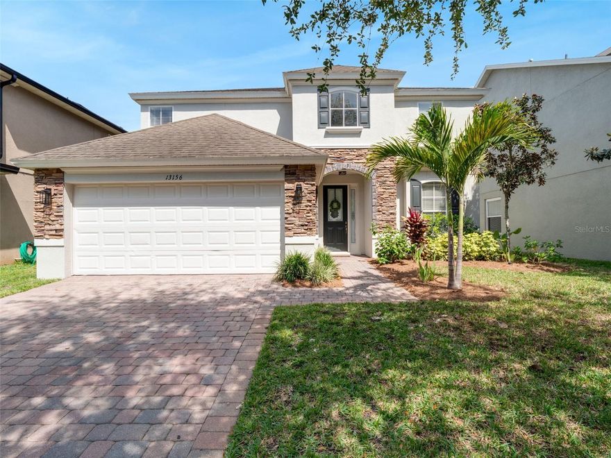 Move-in-ready 5-bedroom, 3.5-bathroom, two-story home with 2,739 square feet of heated living space in the 24-hour guard-gated golf community of Eagle Creek in Lake Nona, Orlando, Florida 32832. Built in 2006 with block-and-stucco construction on a low-maintenance 0.13-acre homesite, this turnkey Eagle Creek residence features a brand-new December 2025 central HVAC system, fresh interior and exterior paint, new stainless steel kitchen appliances, a downstairs primary suite, a dedicated home office, and an upstairs loft.

The open-concept main level offers voluminous ceilings, abundant natural light, and a blend of ceramic tile and wood-style laminate flooring. The modern kitchen anchors the home with new stainless steel appliances, a breakfast bar, a walk-in pantry, wood cabinets, an eating space, and generous counter space, opening directly to the family room and casual dining area. The first-floor primary suite offers dual vanities, a soaking tub, a glass-enclosed shower, and a walk-in closet. Upstairs, four additional bedrooms, two full bathrooms, and a spacious loft deliver flexibility for a media room, study zone, or second living area. Additional features include an interior laundry room with cabinetry, split-bedroom privacy, a covered and screened rear patio, a fully fenced vinyl backyard, and a 2-car attached garage with opener.

Eagle Creek residents enjoy 24-hour manned security, a championship golf course and pro shop, a resort-style community pool, a fitness center, tennis courts, a clubhouse, playgrounds, and scenic walking paths. The location is minutes from Lake Nona Medical City, the USTA National Campus, Lake Nona Town Center, Boxi Park, and Orlando International Airport (MCO), with quick access to SR-417, the 528 Beachline, and Narcoossee Road. Zoned for Luminary Middle School.

Investor-friendly opportunity: property is currently leased through October 2026, delivering immediate rental income at closing in one of Central Florida's strongest rental corridors — ideal for 1031 exchange buyers, buy-and-hold investors, or end-users planning a future move-in. Showings by appointment with advance notice to accommodate the tenant. Lease terms and rent roll available upon request. Schedule your private showing of 13156 Hatherton Circle in Eagle Creek, Lake Nona today.
