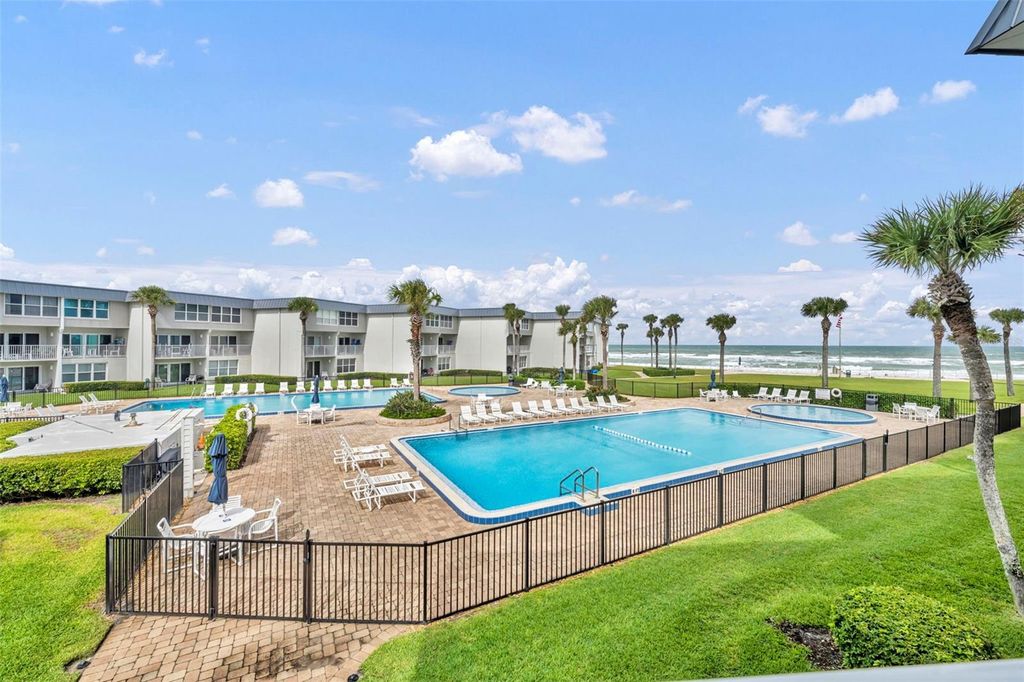 Photo of 4841 Saxon Dr #B201, New Smyrna Beach, FL 32169 (MLS # O6351858)